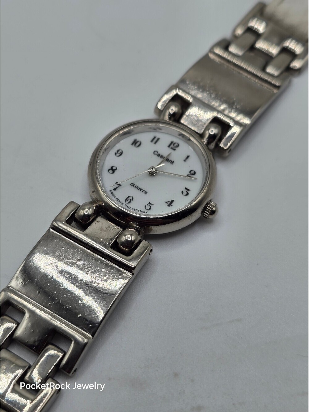 Cassant Women’s Quartz Analog White Dial Arabic Silver Case White Leather
